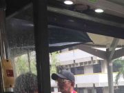 Bus driver in Singapore makes sure his passengers don’t get wet, holds umbrella Singapore bus driver holds umbrella
