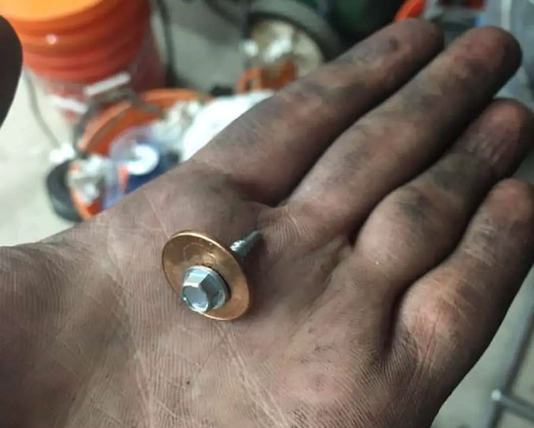 Mechanic drills a hole in a penny for this genius reason - Alt Car news