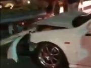 Miami warehouse drag racers drive towards canal barrier & crash