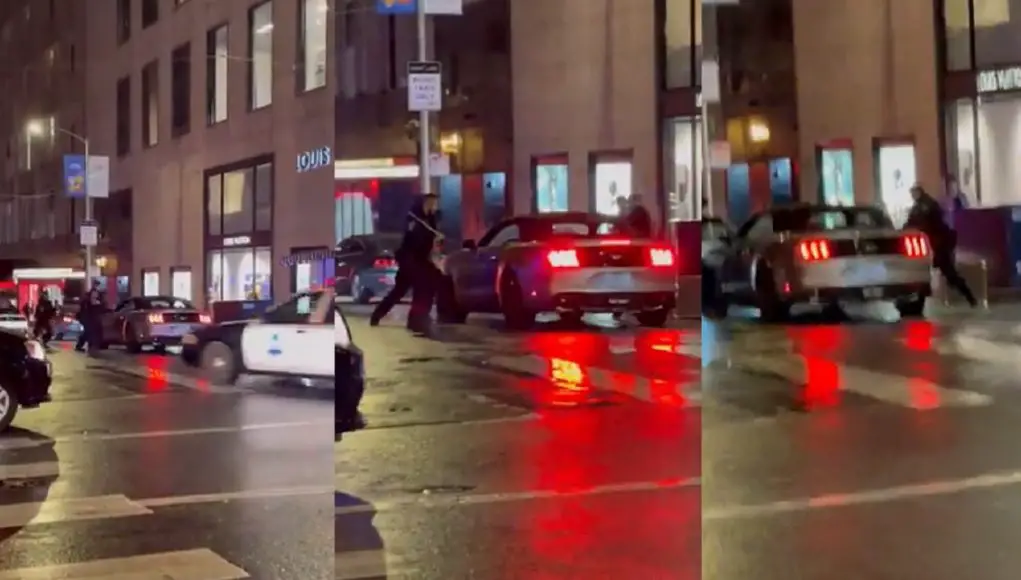 San Francisco police smash the windows of a fleeing driver's Ford Mustang