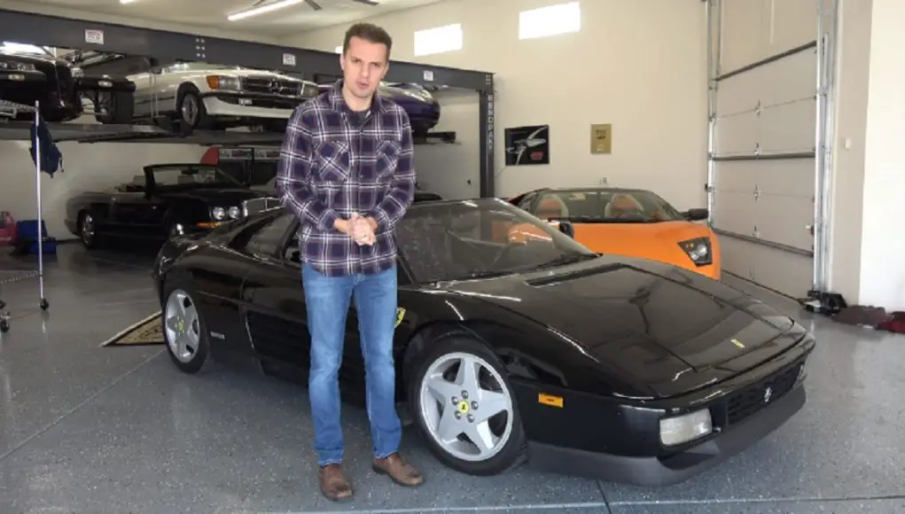 Tyler Hoover in front of his Ferrari 348 for sale