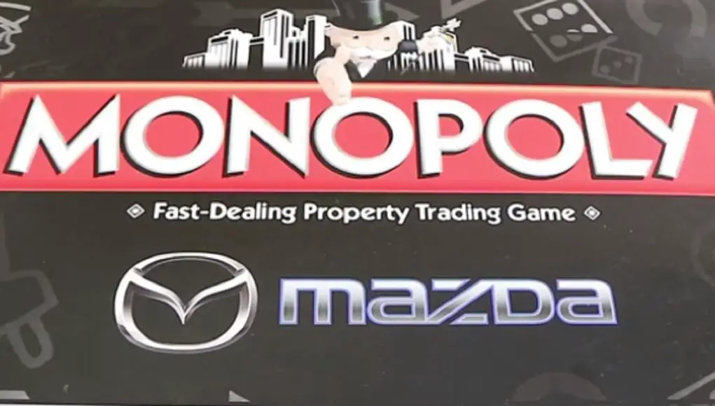 The front of a Mazda-themed Monopoly set