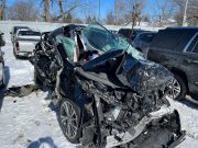 The front of a crashed 2020 Acura MDX