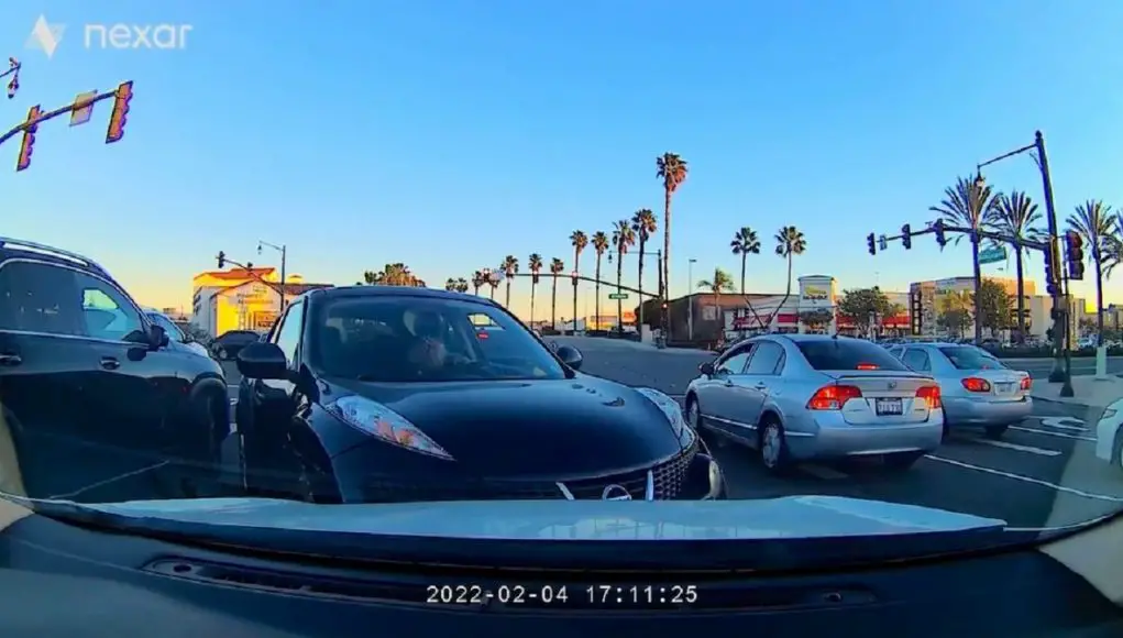 Nissan Juke driver in Laguna Hills driving into a dashcam owner's front bumper