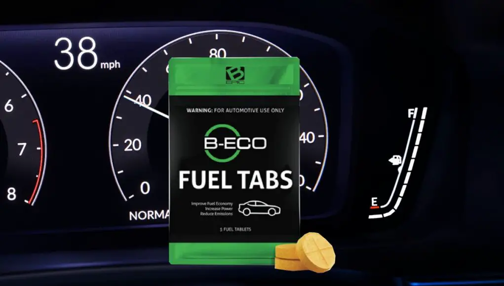 A packet of B-Eco fuel tablets in front of a 2022 Honda Civic Hatchback fuel gauge