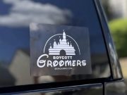 A Boycott Groomers decal on the back of a window made by Bring Ammo