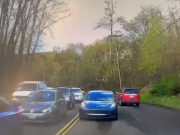 Tesla Model 3 driver popping out of their lane into oncoming traffic