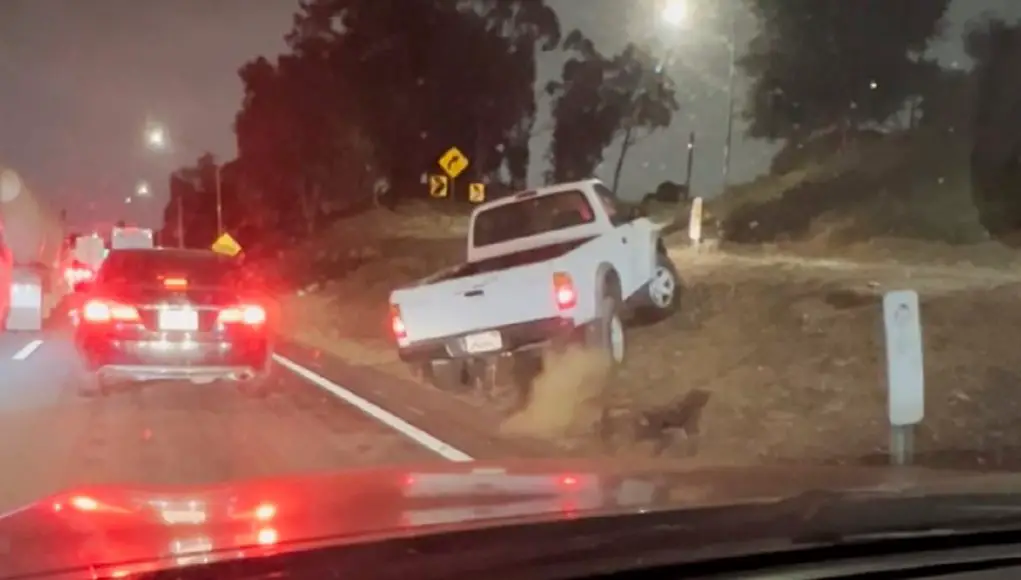 Driver in Toyota Tacoma fails at making it up dirt embankment