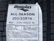 A tire label for Douglas All-Season tires