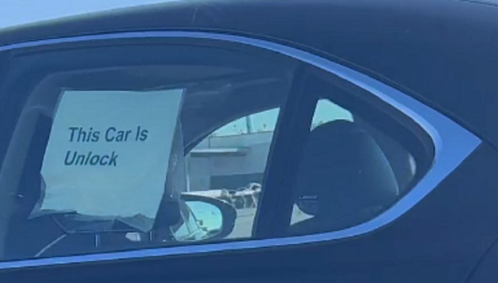 Sign on car in bay Area that says, 