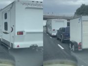 A semi truck is towing three other vehicles behind it and it's perfectly legal