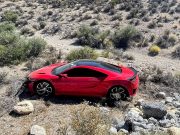 A wrecked rental Acura NSX on the side of the road in Red Rock Canyon Las Vegas