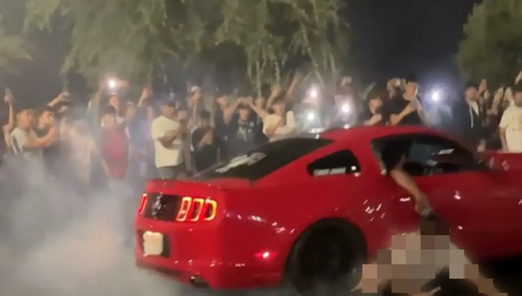 Sacramento sideshow spectator gets his pants ripped off by Ford Mustang