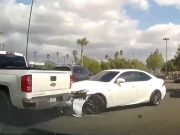 Chevrolet Silverado running over the front bumper of a Lexus IS