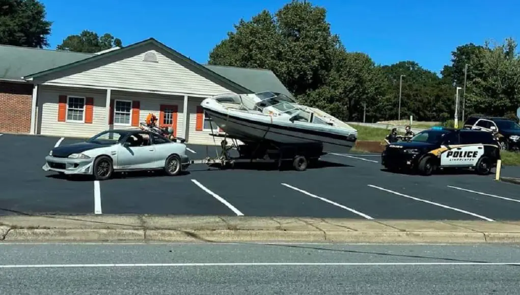 Man pulled over in Lincolnton for towing a Bayliner on a sketchy trailer with just an old Chevrolet car