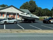 Man pulled over in Lincolnton for towing a Bayliner on a sketchy trailer with just an old Chevrolet car