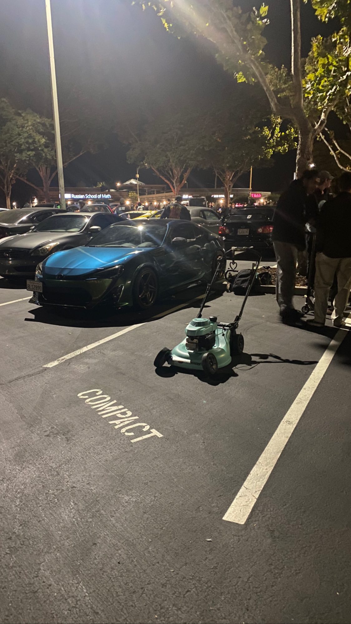 A modded lawn mower at a Bay Area car meet