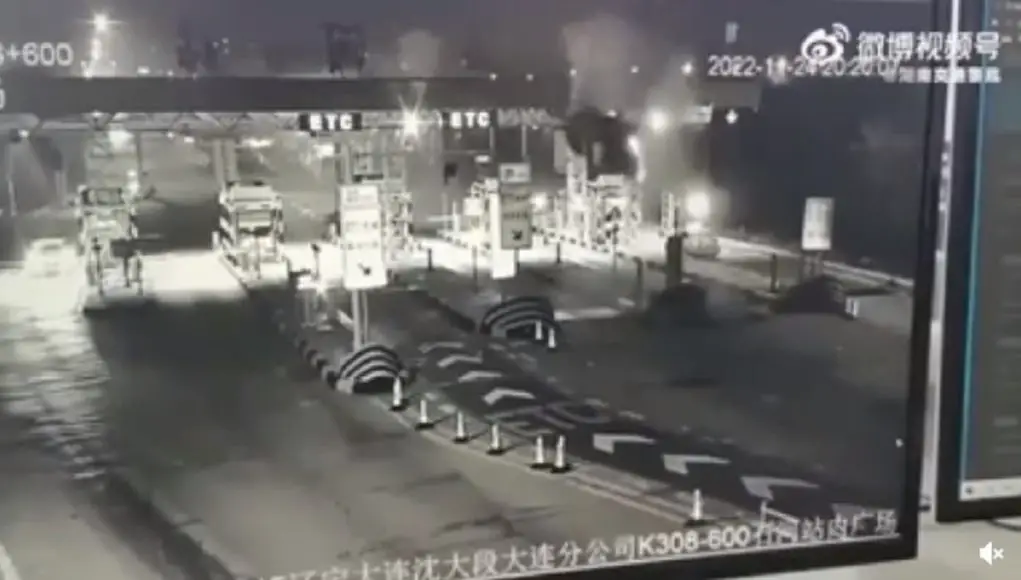Driver in China survives after crashing into tollbooth barrier and launching into the air