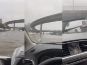 Bay Area driver going through a flooded section of Highway 101 near South San Francisco