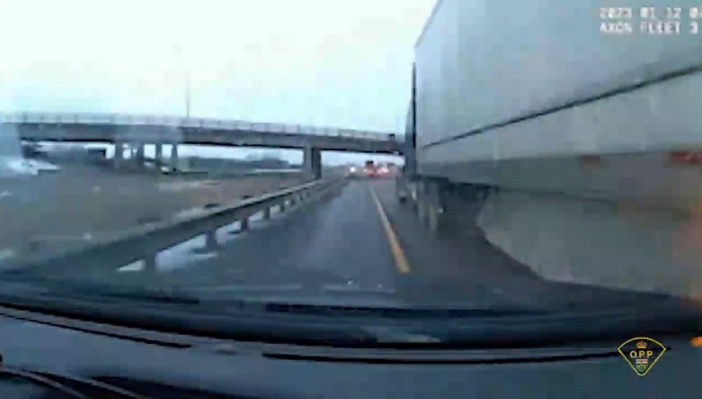 Semi truck driver in Ontario changes lane in front of police cruiser