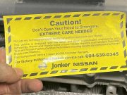 Warning sticker placed by car dealerships meant to scare customers into using their service.