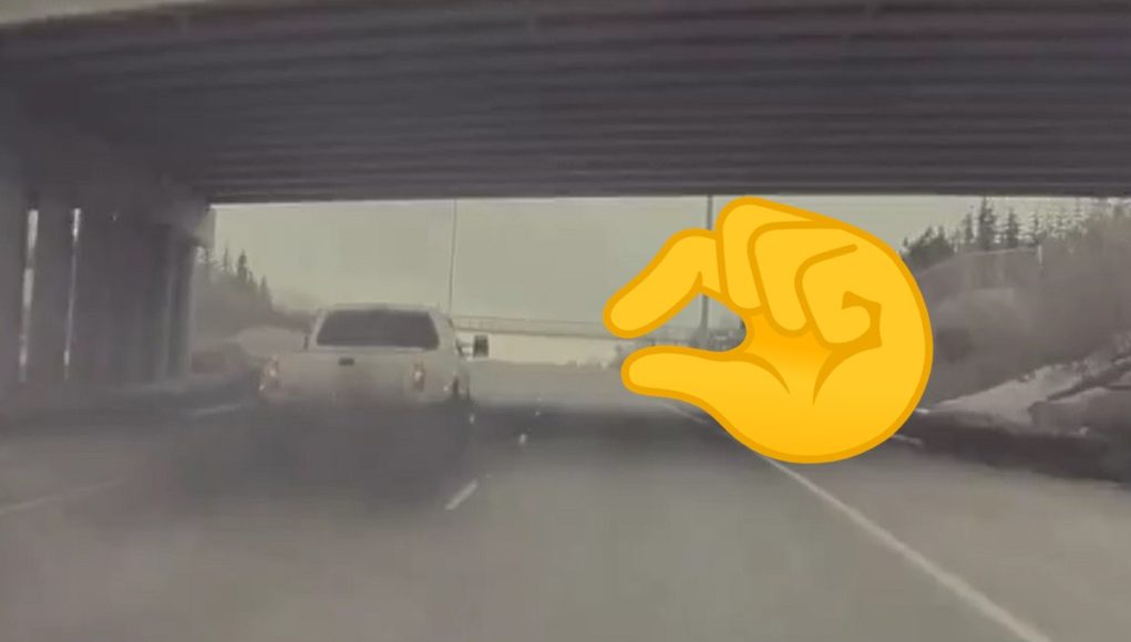 Driver in Ford Dually rolls coal on Tesla with small weiner emoji