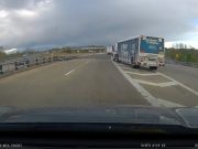 A Blue Rhino Propane delivery truck drives through a gore point