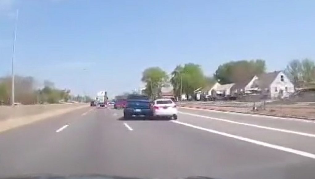 Driver in Dodge Ram forces car off the road after making multiple lane changes