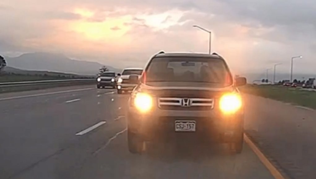 Driver is in the wrong sitting in the passing lane even though he's going 10 above the speed limit.