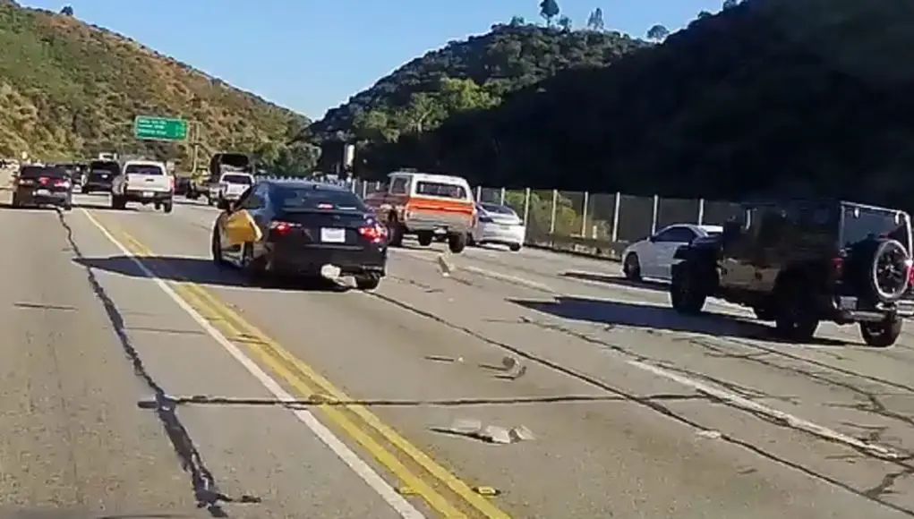 Driver litters on the Sepulvedas Pass in Los Angeles.