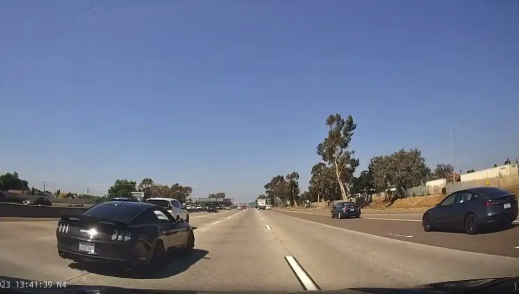 A Ford Mustang does triple digit speeds on the 805
