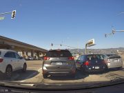 VW GTI driver lane splits between two cars in Oakland, CA