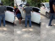 Lady in Honduras used her weight to get stuck taxi out of a ditch.
