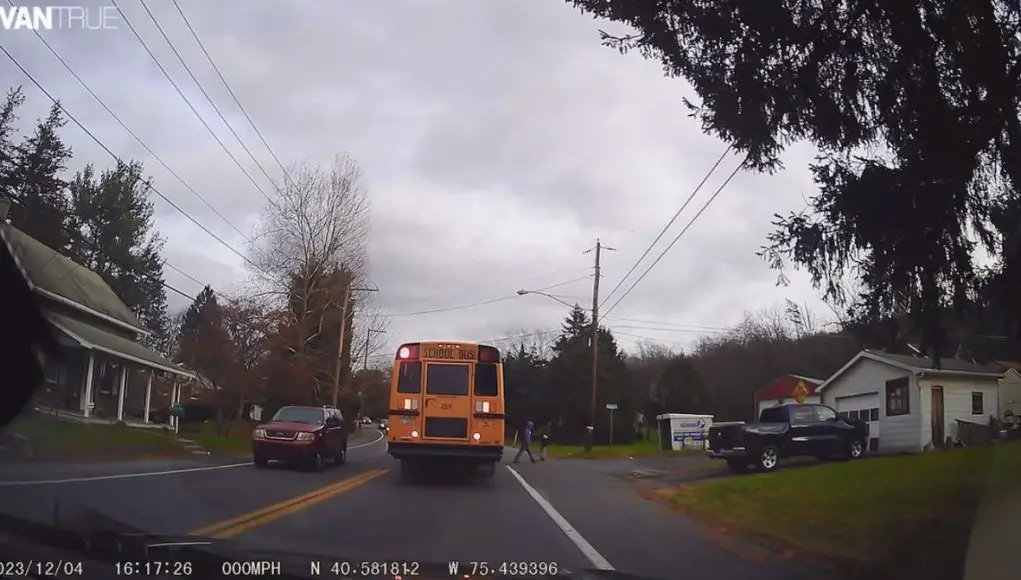 Driver in Allentown, PA blows by school bus