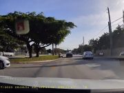 Driver in Miami, FL does a no look left turn across multiple lanes.
