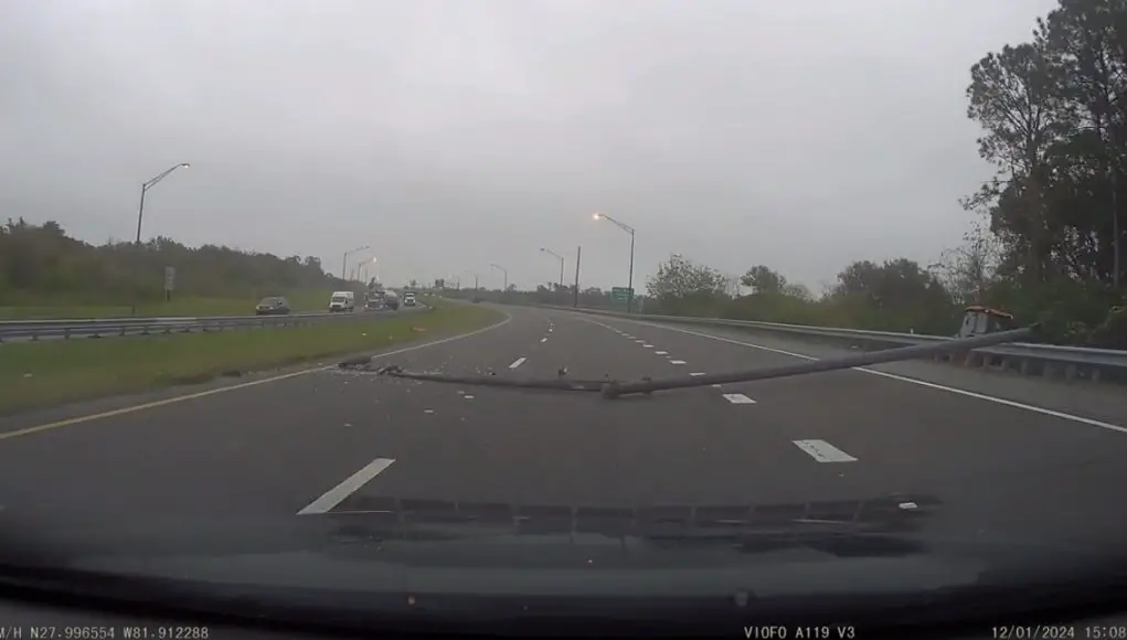 An entire light pole toppled over on the Polk Parkway and it was caught on dash cam