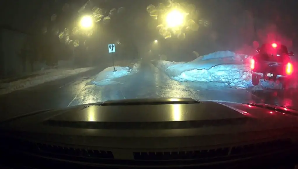 Ford Super Duty in Nebraska drives into a snow bank.