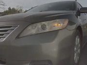 Driver in Toyota Camry Hybrid uses a turn only lane to try to cut in front of other drivers.