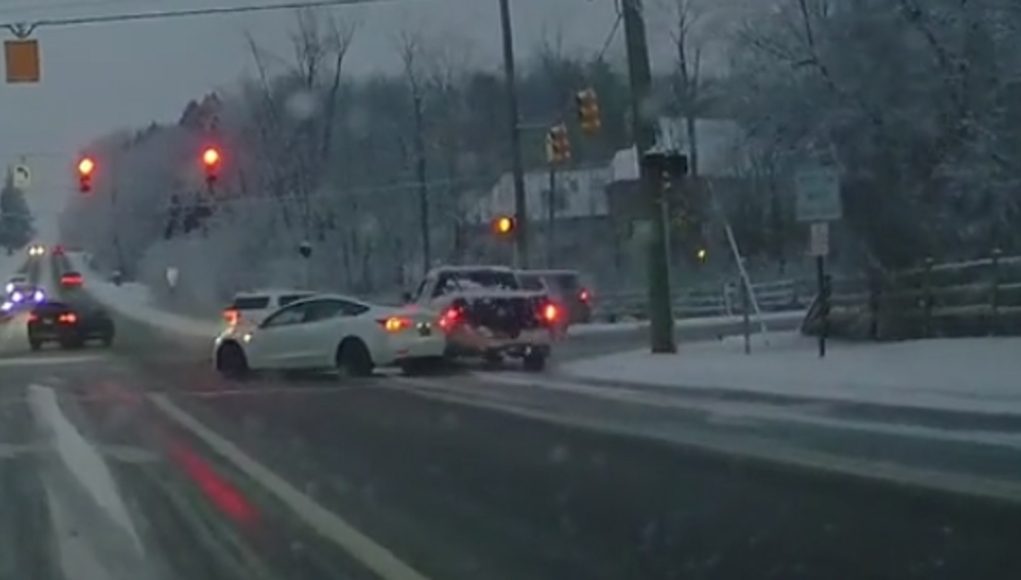 Tesla driver in bloomfield TWP going too fast in the snow. Crashes.