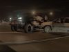 Lifted truck driver gets t-boned by other driver. They both were trying to run red lights at the same time.