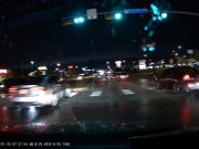Driver in San Antonio, TX hops over center median from left turn only lane.