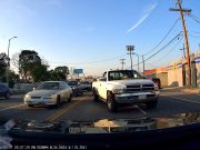 Driver in Central Los Angeles drives on the wrong side of the road.