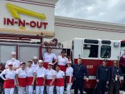Oakland Firefighters posing outside of an In-N-Out.