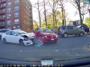 Driver in Yonkers fails to yield properly, gunning it across cross traffic, and gets t-boned as a result.