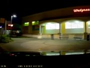 Driver in Orlando, FL enters Walgreens from the wrong direction, using the sidewalk.