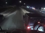 Jeep driver brake checks semi.