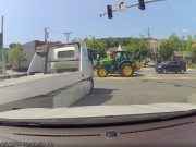 Carvana driver in Yardsley, NY cuts off driver stopped at a no turn right on red turn, driving over a curb to do so.