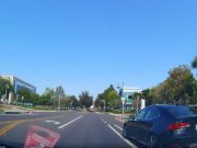 Lexus uses bike lane as passing lane in Long Beach, CA near Douglas Park.