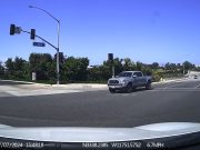 Tacoma driver in Newport Beach blames other driver for nearly running red light