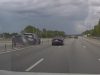 Trailer-towing SUV runs over lane seperators causing windshield damage to this driver in Tampa, FL